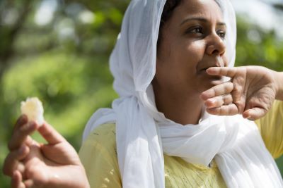 Sumeet tasting honey.jpg