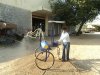 Mr Sangappa with his spraying machine 1.jpg